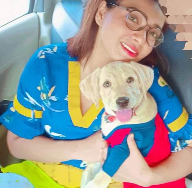 Rekha Mona Sarkar with her pet dog Shinu