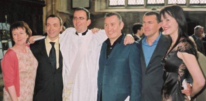 Reverend Richard Coles (third from left) with family on his ordinance day