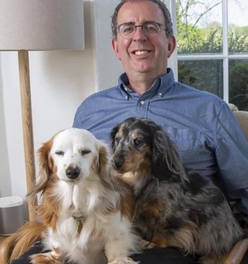 Reverend Richard Coles with his pet dachshunds