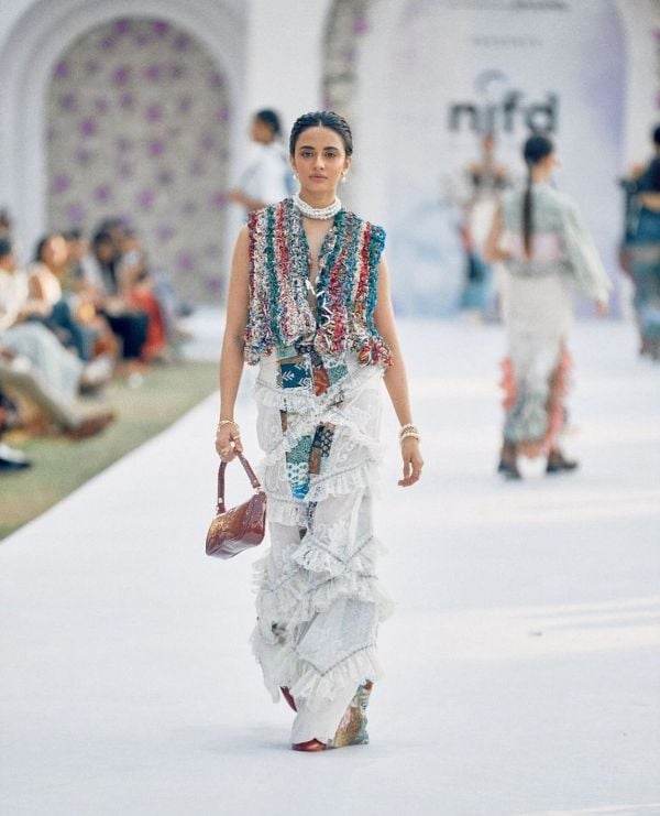 Rhea Singha while walking the ramp at a fashion show