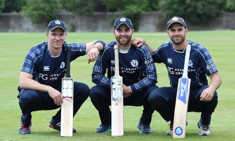 Richie Berrington, Preston Mommsen and Kyle Coetzer after achieving 1,000 ODI runs