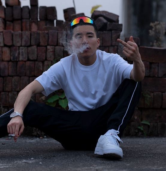 Rigden Nadik Bhutia smoking a cigarette