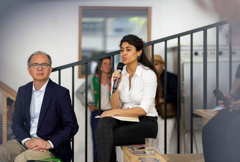 Rima Hassan speaking at a roundtable discussion on World Refugee Day