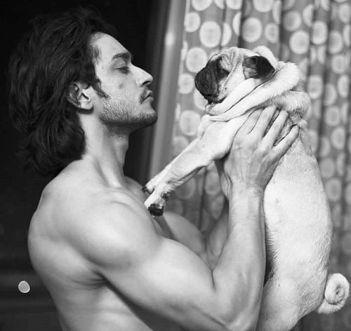 Rishabh Sinha with his pet dog Gizmo