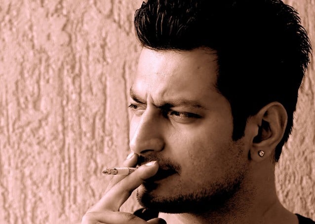 Rishabh Tandon while smoking a cigarette