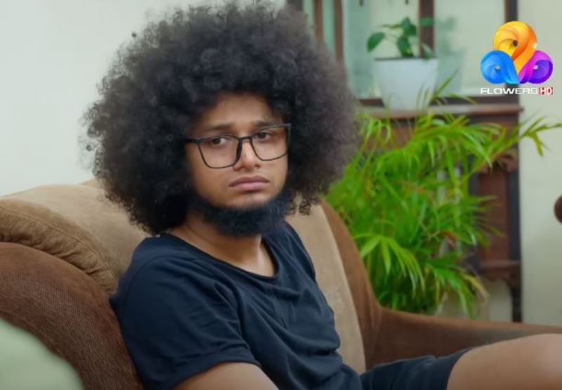 Rishi S Kumar in a still from the Malyalam sitcom Uppum Mulakum (2014)