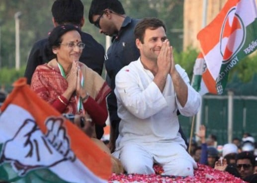 Rita Bahuguna Joshi with Rahul Gandhi while addressing a political rally
