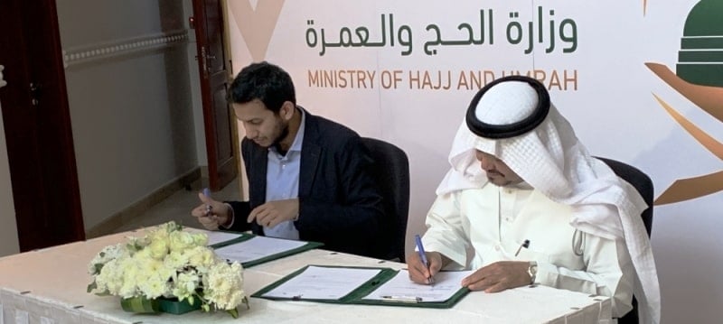 Ritesh Agarwal signing an MOU with the Minister of Hajj And Umrah of the Saudi Arabian government