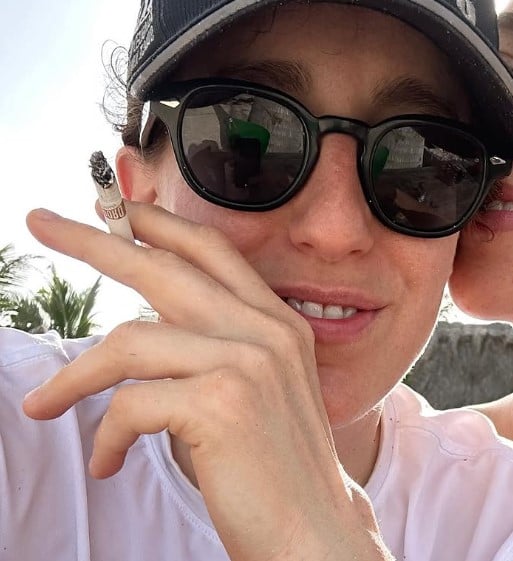 Robby Hoffman while smoking a cigarette