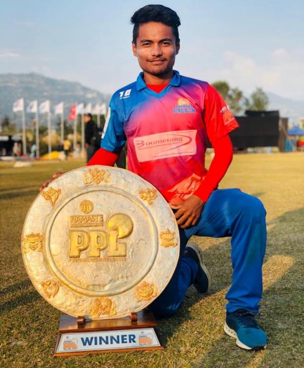 Rohit Paudel with the Pokhra Paltan League (PPL) Trophy