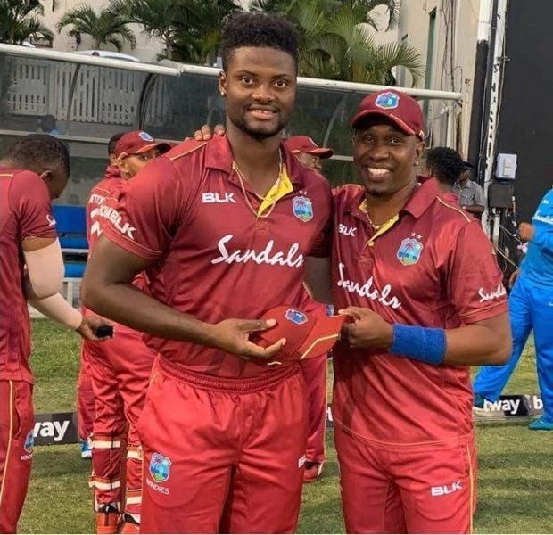 Romario Shepherd with Dwayne Bravo
