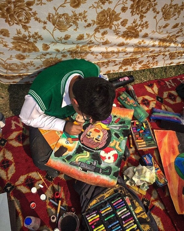 Ronit Ashra drawing during a school competition