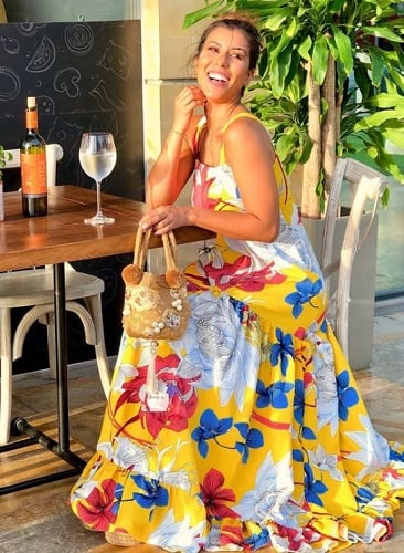 Rosa Caiafa with a glass of wine