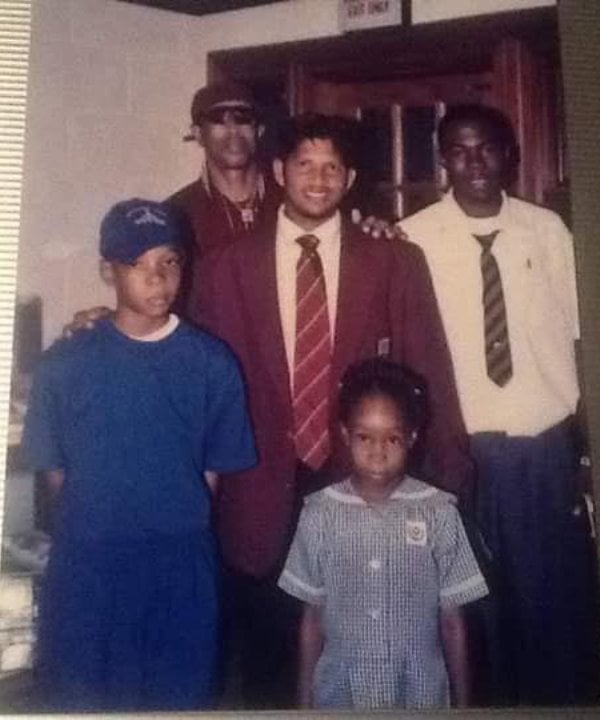 Roston Chase (in blue) childhood photo with his idol Ramnaresh Sarwan