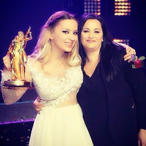 Rozana Radi holding the Dance With Me trophy (2015)