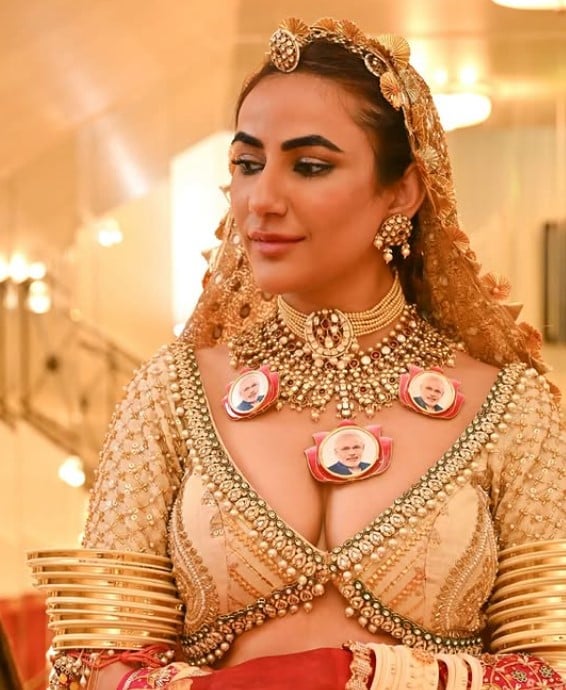 Ruchi Gujjar while wearing a pendant with Prime Minister Narendra Modi’s face