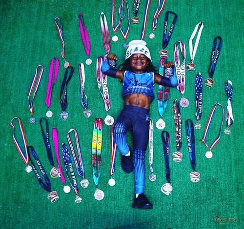Rudolph Ingram with his medals