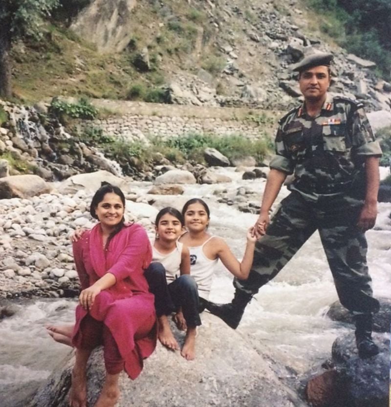 Rukmini Vasanth as a child with her family