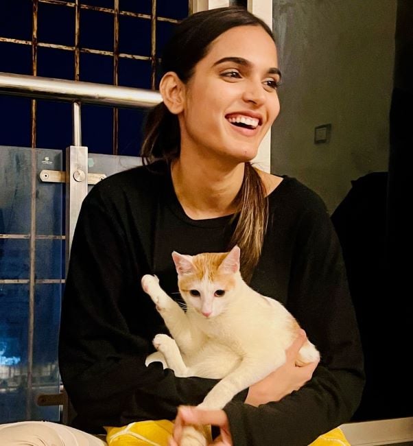 Rushali Yadav with a cat meow