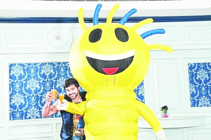 Sabyasachi Mishra and the mascot Happy at a hotel in Bhubaneswar