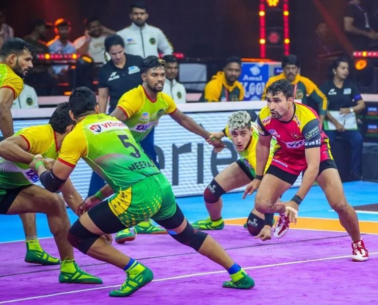 Sachin Narwal (in red jersey) during a match in Pro Kabaddi League Season 9