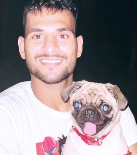Sachin Tanwar posing with his pet