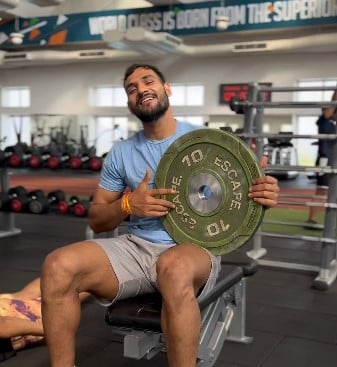 Sachin Tanwar while posing at a gym