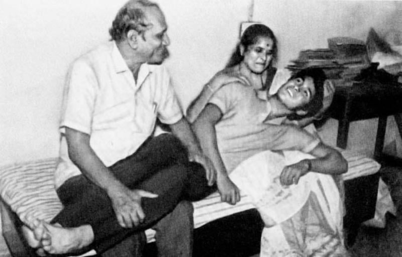 Sachin Tendulkar Lying in The Lap of His Parents