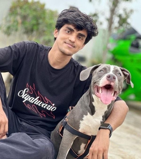 Sagar Thakur (Maxtern) with a dog