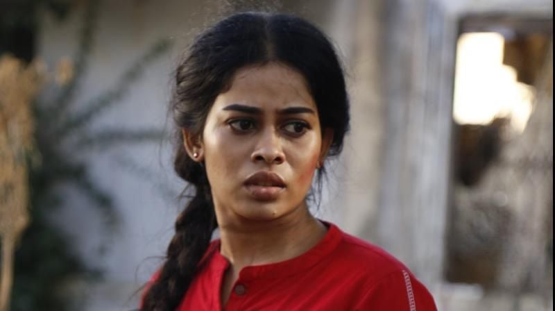 Sai Priyanka Ruth as Rasiya/Jaya in a still from the Tamil film Gangs of Madaras