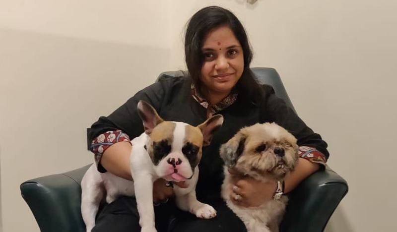 Saindhavi with her pet dogs, Toky (left) and Chilli (right)