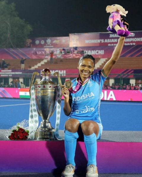 Salima Tete posing with the winning trophy of the 7th Women