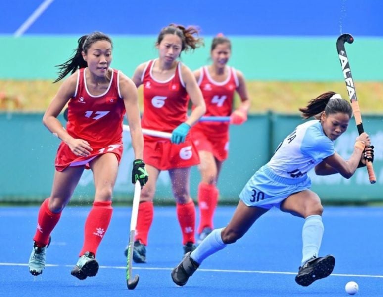 Salima Tete (wearing blue) during a match at the 19th Asian Games in Hangzhou, China (2023)