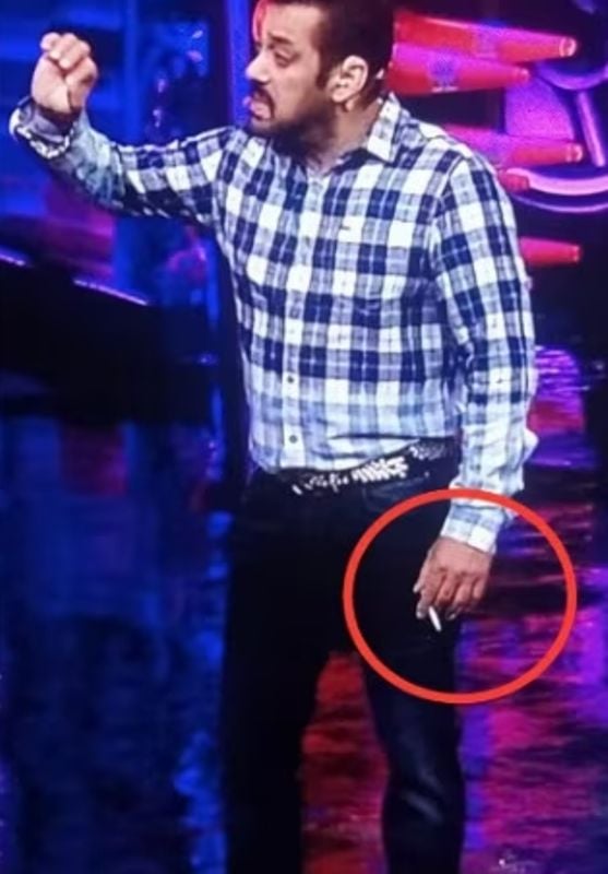 Salman Khan holding a cigarette while hosting Bigg Boss OTT 2