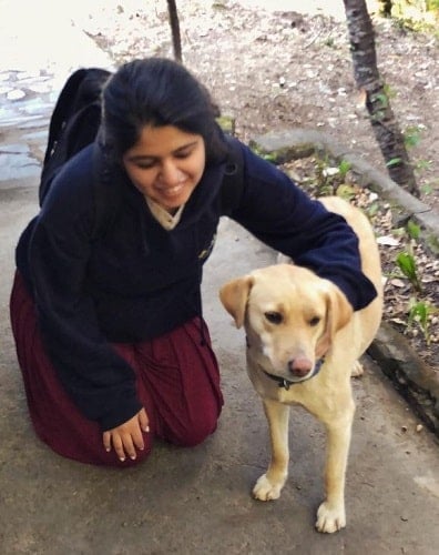 Saloni Kukreja with a dog