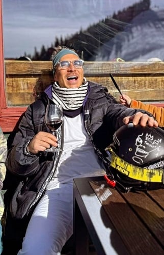 Salvador Zerboni holding a glass of wine