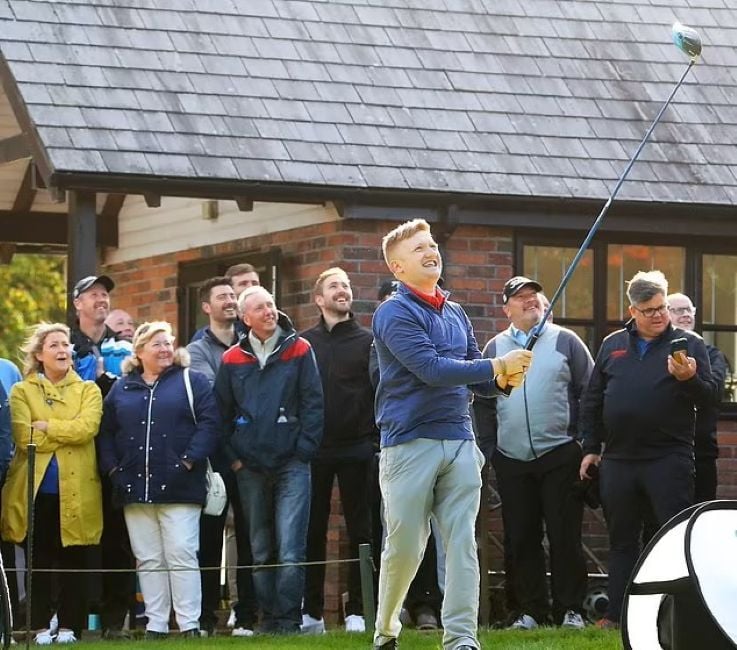 Sam Aston playing golf