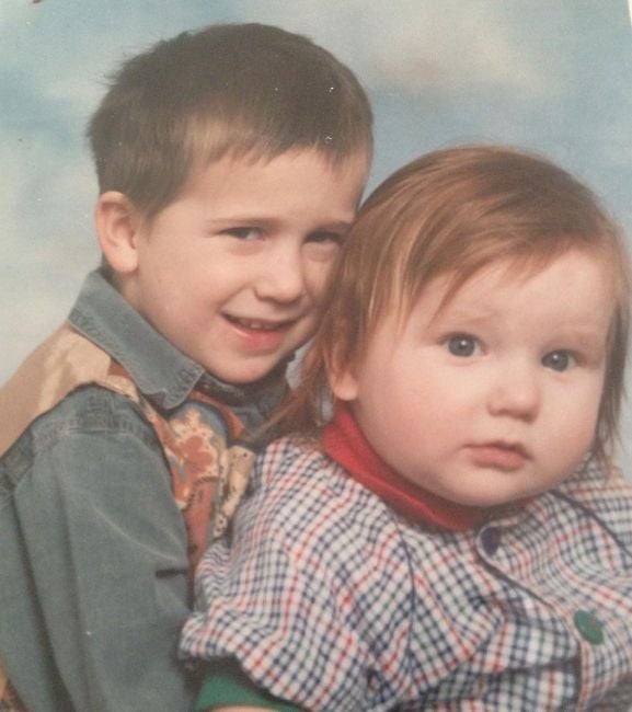 Sam Aston (right) during his childhood