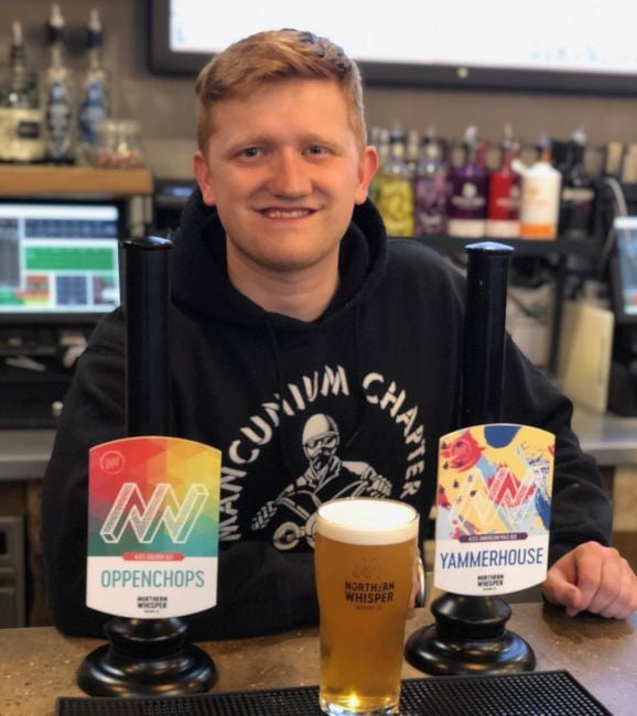 Sam Aston with a glass of alcohol