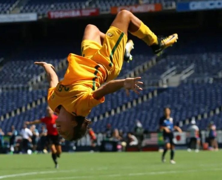 Sam Kerr doing a backflip after scoring a hattrick for Australia