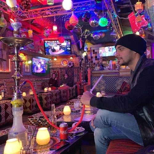 Sam Merchant smoking hukka