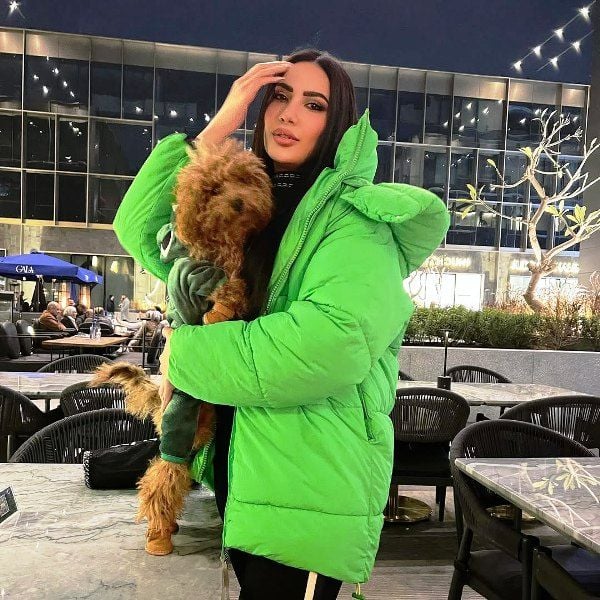 Sama Kamel with a dog