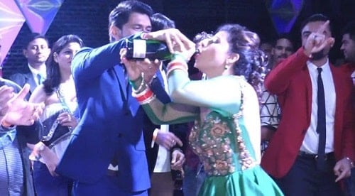 Sambhavna Seth drinking champagne