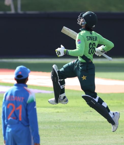 Sameer Minhas celebrating his hundred against India Under-19 team