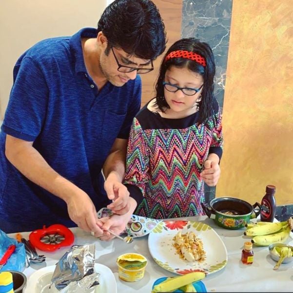 Sameer Saxena cooking with his daughter