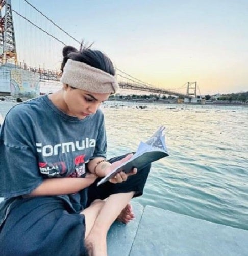 Samyuktha Menon reading a book