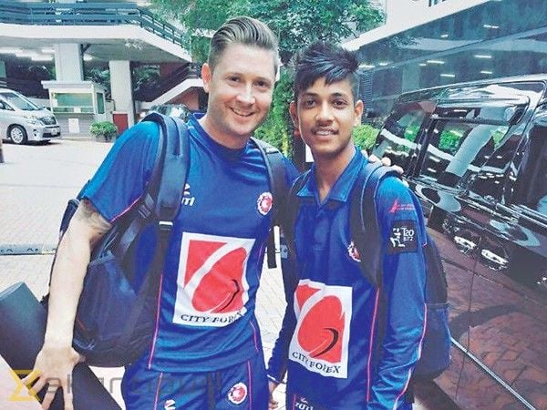 Sandeep Lamichhane with former Australia skipper Michael Clarke