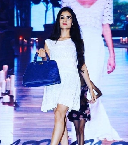 Sangeeta Odwani walking the ramp in a fashion show