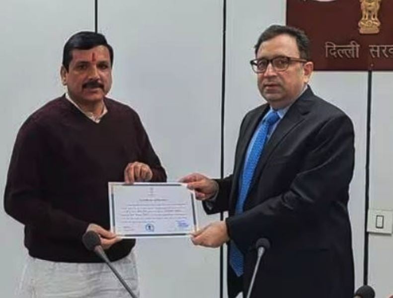 Sanjay Singh while receiving the certificate from the Returning Officer Ashish Kundra on 12 January 2024