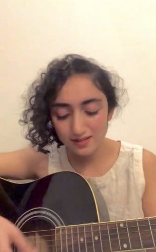 Sanjeeta Bhattacharya playing the guitar